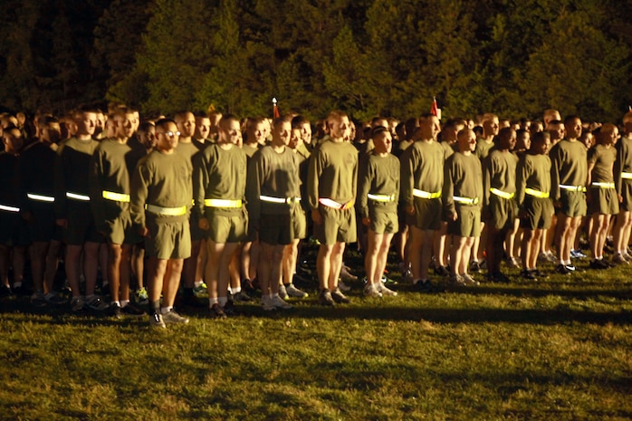 Marines and sailors with 2nd Marine Logistics Group make a formation before starting a three-mile run during a unit run at Soifert field aboard Camp Lejeune, N.C., April 25, 2013. Brig. Gen. Edward D. Banta, the commanding general of 2nd MLG led the Marines and sailors as companies yelled cadences. 