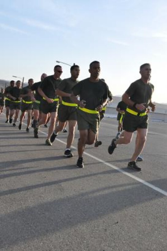 Captain Stafford Buchanan, the commanding officer of Headquarters Battalion on Marine Corps Logistics Base Barstow, takes his Marines for a five mile run, April 24. The Marines run as part of their physical training and to build camaraderie.


