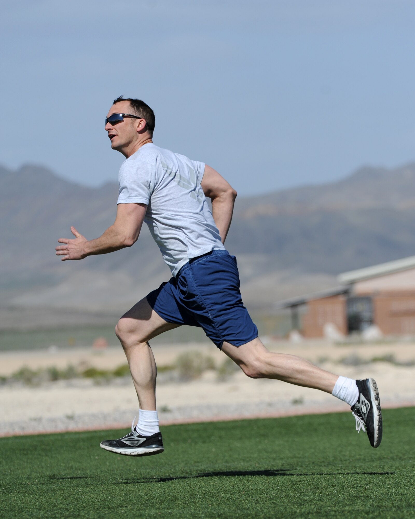LAS VEGAS, Nev. -- Tech. Sgt. Scott performs sprint exercises during a unit workout session April 9, 2013. The section shift supervisor frequently attends 432nd Aircraft Maintenance Squadron unit fitness sessions and assists members to reach their personal fitness goals. (U.S. Air Force photo by Senior Master Sgt. P.H./Released)