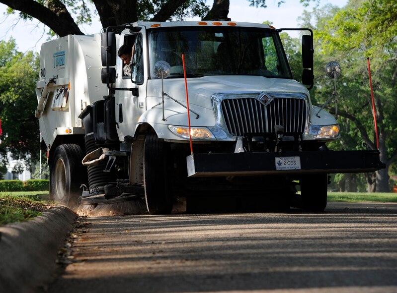 Staff Sgt. Kyle Pullum, 2nd Civil Engineer Squadron Heavy Repair section, operates a street sweeper on Barksdale Air Force Base, La., April 25, 2013. Heavy Repair Airmen, also known as "Dirt Boys", lay down pavement, operate heavy equipment and maintain the roads and flightline in order to support Barksdale's mission of delivering precision munitions to the battlefield. (U.S. Air Force photo/Airman 1st Class Andrew Moua)
