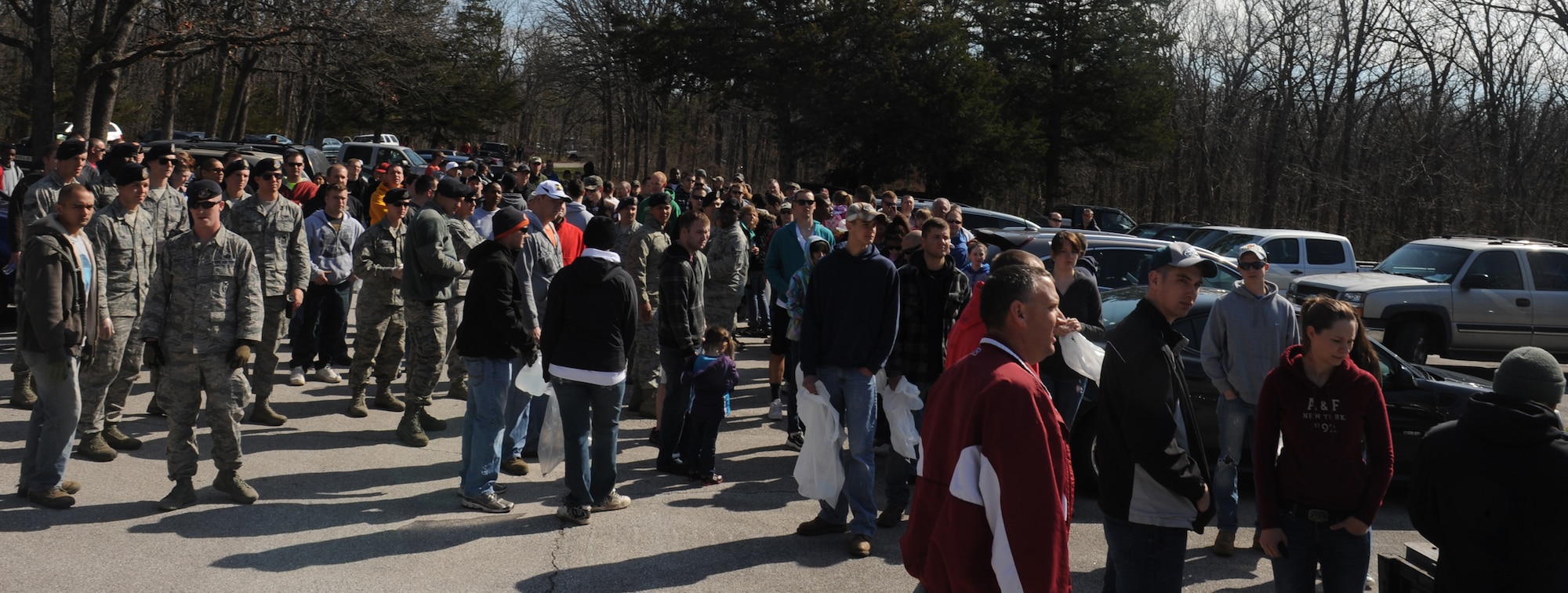 Members of Team Whiteman gather at Knob Noster State Park, Mo., to collect trash, April 20, 2013. Approximately 250 volunteers participated, including military members, spouses and children. (U.S. Air Force photo by Airman 1st Class Bryan Crane/Released)