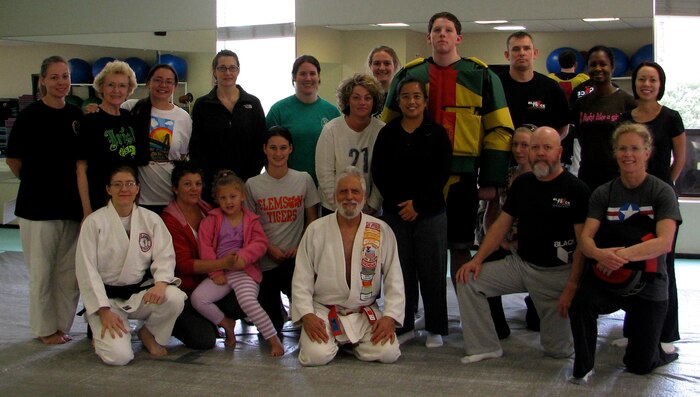 Participants take a break during the Women’s Self-Defense Seminar April 20, 2013, at the Morale, Welfare and Recreation Athletics Facility at Joint Base Charleston – Weapons Station, S.C. This free, two-hour clinic, as part of the activities of Sexual Assault Awareness Month, was presented by Black Force MMA Academy and was designed to educate females about their options for self-defense. (Courtesy photo)