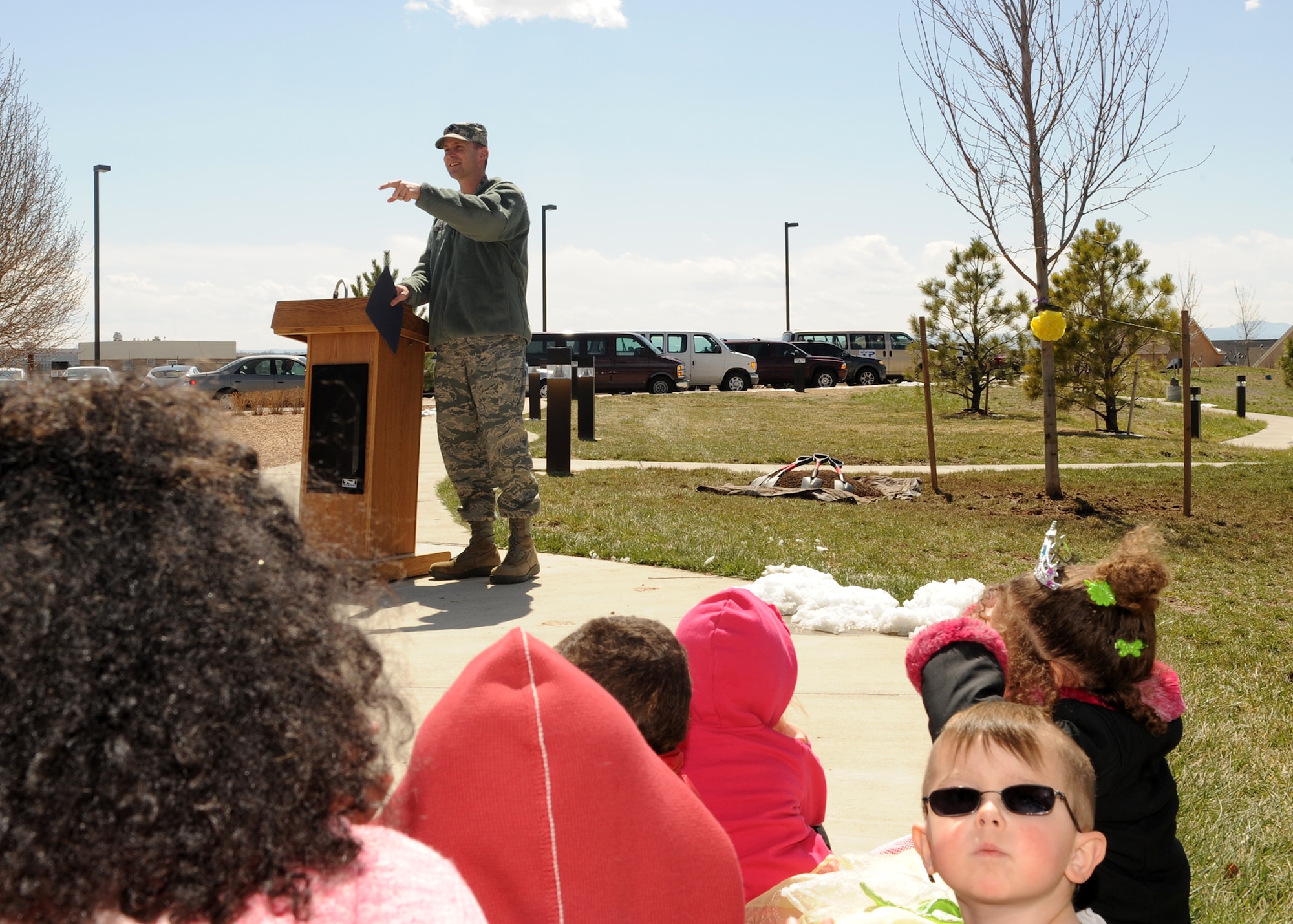 Lt. Col. Madison Morris, 460th Civil Engineer Squadron commander, gives the opening remarks during the Arbor Day celebration April 24, 2013, at Buckley Air Force Base, Colo. Countries around the world plant trees to celebrate Arbor Day, which began in Nebraska City, Neb., in 1872. (U.S. Air Force photo by Senior Airman Marcy Glass/Released)