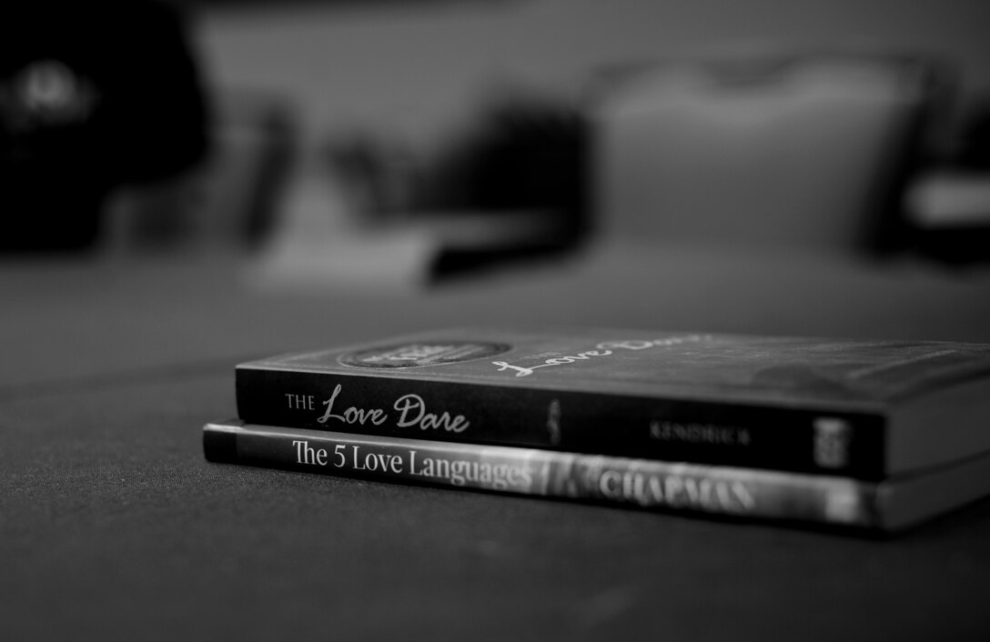 Books focused on enhancing marriages and relationships were given to couples participating in a four-day marriage care retreat hosted by the 28th Bomb Wing Chapel staff in Denver from April 18 to 21. Among the books given out was “The 5 Love Languages,” by Gary Chapman which teaches principles such as how each person has a different way of speaking and understanding love and how it is imperative to successful relationships to know which love language is being spoken. (U.S. Air Force photo by Airman 1st Class Anania Tekurio/Released)