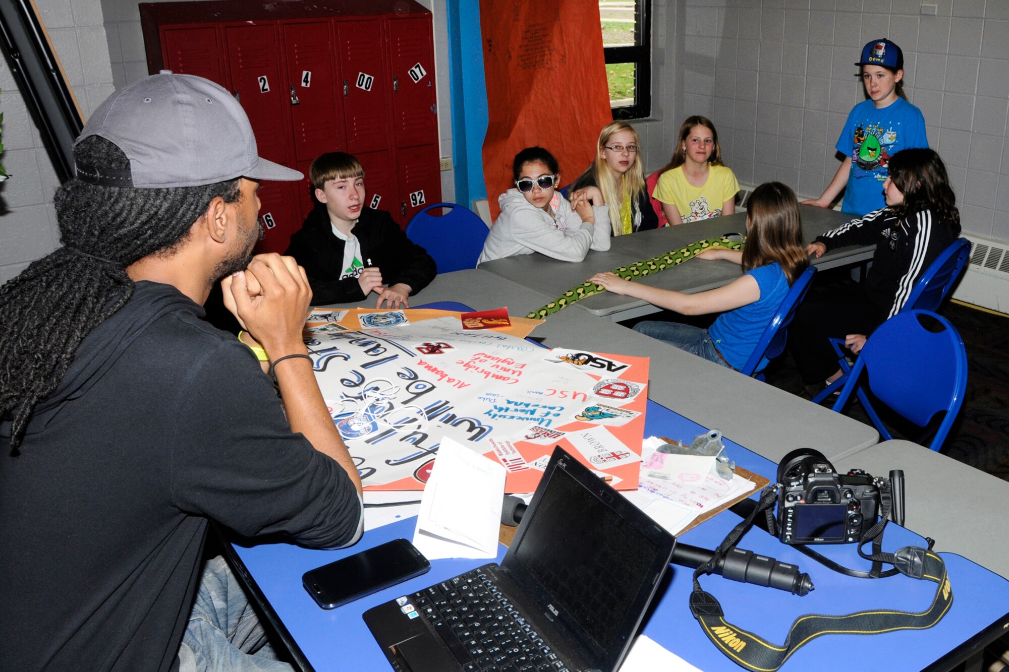 HANSCOM AIR FORCE BASE, Mass. -- Stephen Pulliam, a music producer, speaks to children during a "Say it with Music" camp that took place at the Youth Center during school vacation, April 19. Pulliam provided children advice on their music camp video they were producing as part of the class. (U.S. Air Force photo by Linda LaBonte Britt) 