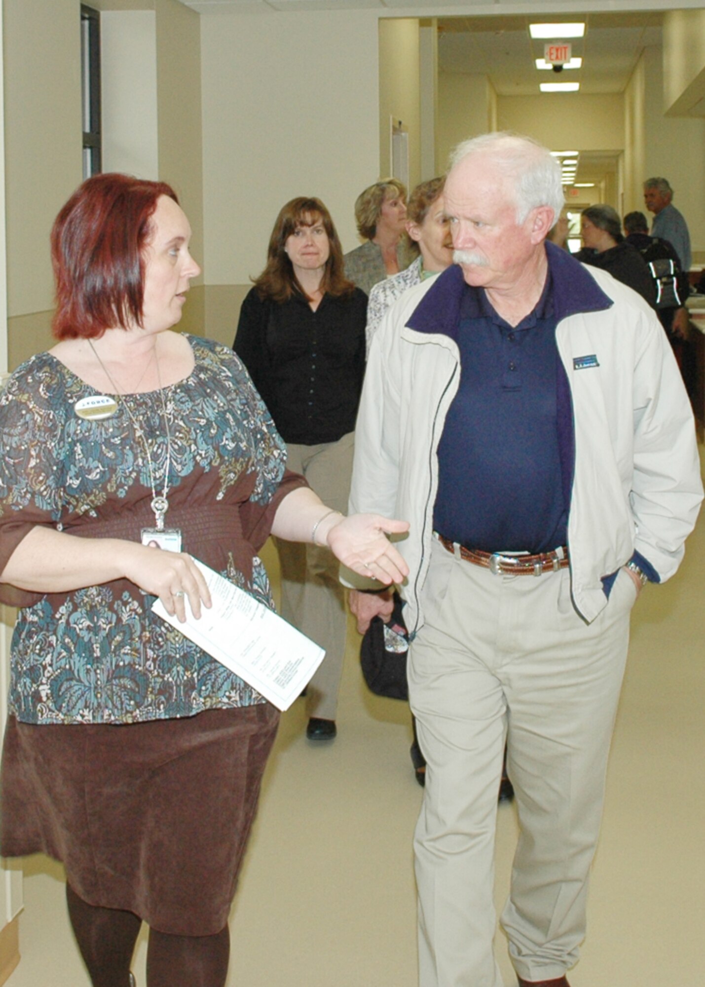 Mary Duncan, 72nd Force Support Squadron Airman and Family Services, gives retired Col. Craig Wolfenbarger a tour of the new Child Care Development Center. Colonel Wolfenbarger is the spouse of Gen. Janet Wolfenbarger, commander of Air Force Materiel Command.
