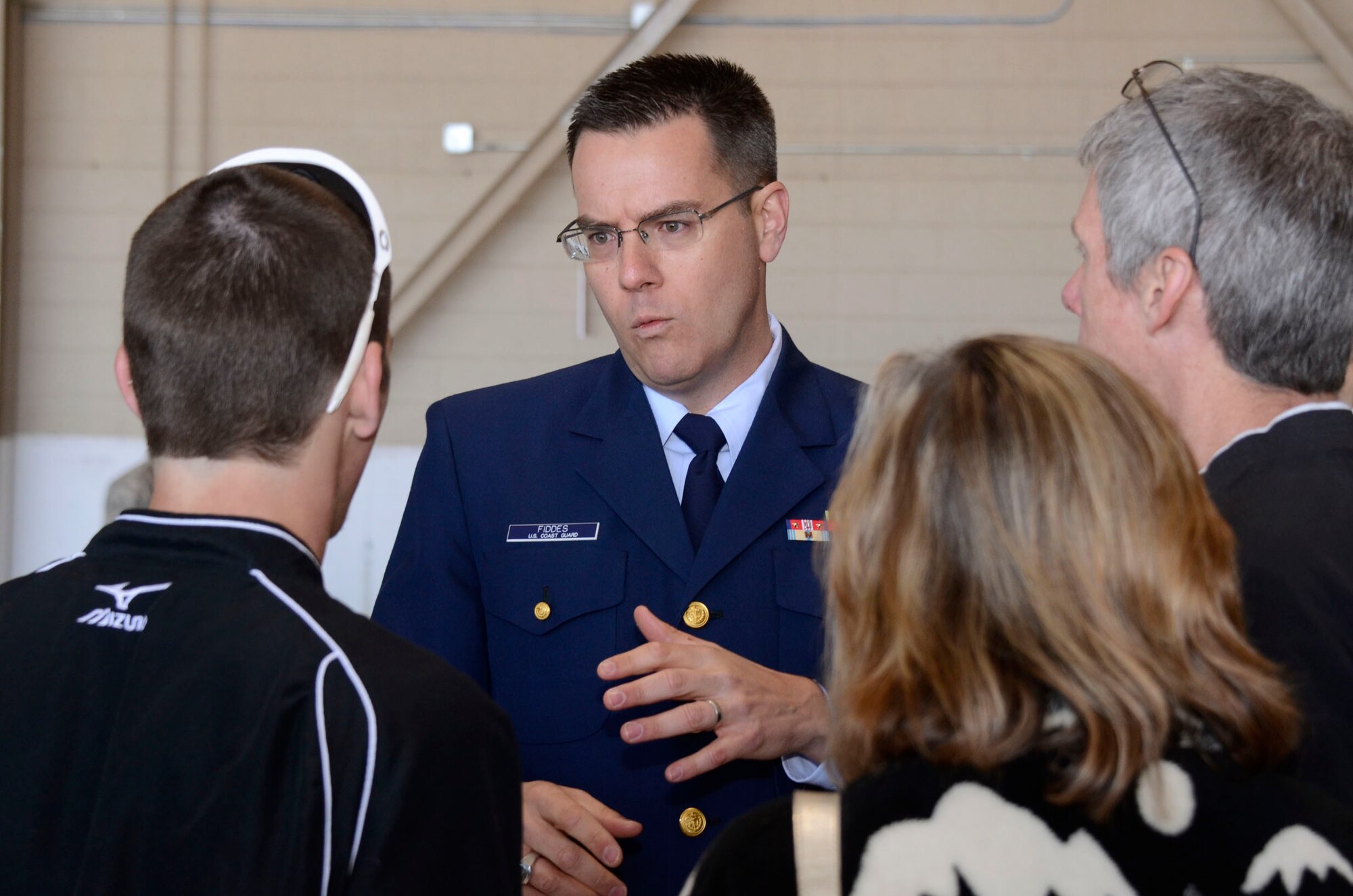 Representatives from the U.S. Coast Guard Academy provides visiting students and their parents with information on the Academy experience during the 2013 Georgia Congressional Delegation Academy Day held at Dobbins Air Reserve Base, Ga., and April 20. (U.S. Air Force photo/Don Peek)