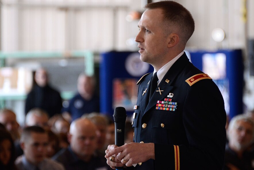 Maj. John Turner. United States Military Academy Southeastern Regional Director of Admissions, speaks to students and family members about the academy application experience during the 2012 Georgia Congressional Delegation Academy Day held at Dobbins Air Reserve Base, Ga., and May 12. (U.S. Air Force photo/Don Peek)