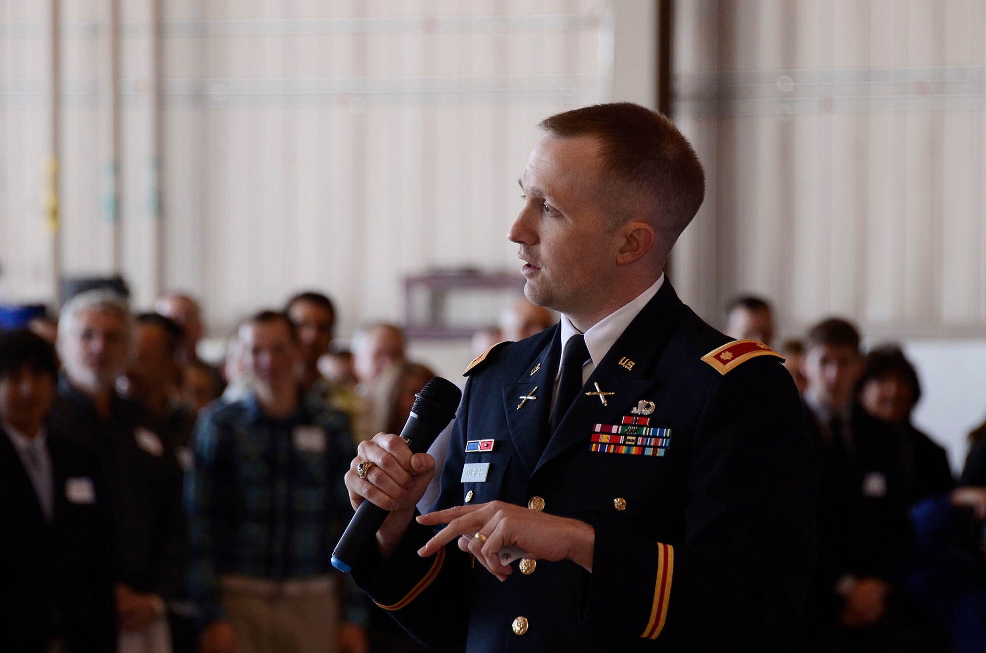 Maj. John Turner. United States Military Academy Southeastern Regional Director of Admissions, speaks to students and family members about the academy application experience during the 2012 Georgia Congressional Delegation Academy Day held at Dobbins Air Reserve Base, Ga., and May 12. (U.S. Air Force photo/Don Peek)