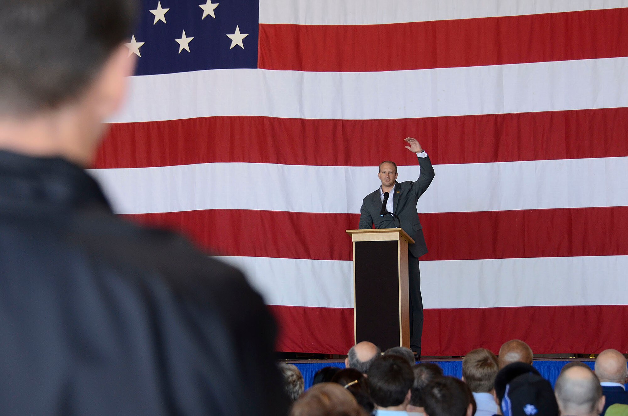 Jared Ogden, former U.S. Navy Seal speaks to students and family members about the academy experience and the valuable opportunities offered through the various services during the 2013 Georgia Congressional Delegation Academy Day held at Dobbins Air Reserve Base, Ga., and April 20. (U.S. Air Force photo/Don Peek)