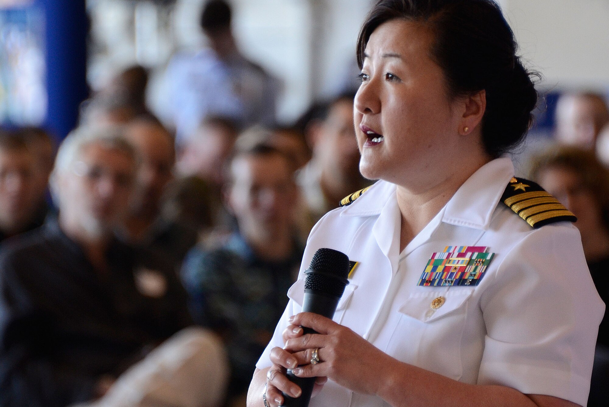 Capt. Ann Kubera, Admissions Director from the U.S. Naval Academy speaks to students and family members about the academy application experience during the 2013 Georgia Congressional Delegation Academy Day held at Dobbins Air Reserve Base, Ga., and April 20. (U.S. Air Force photo/Don Peek)