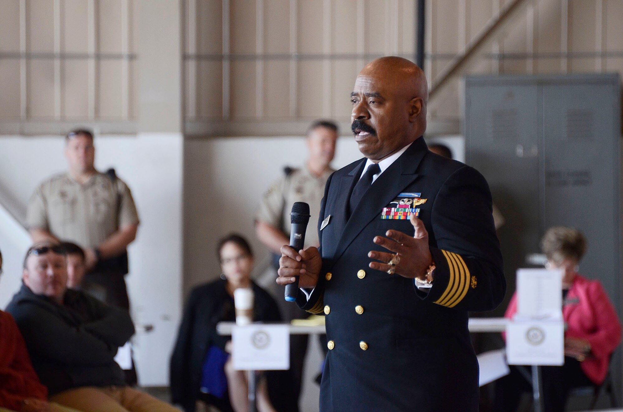 Capt. Robert Johnson, Admissions Director from the U.S. Merchant Marine Academy speaks to students and family members about the academy application experience during the 2013 Georgia Congressional Delegation Academy Day held at Dobbins Air Reserve Base, Ga., and April 20. (U.S. Air Force photo/Don Peek)