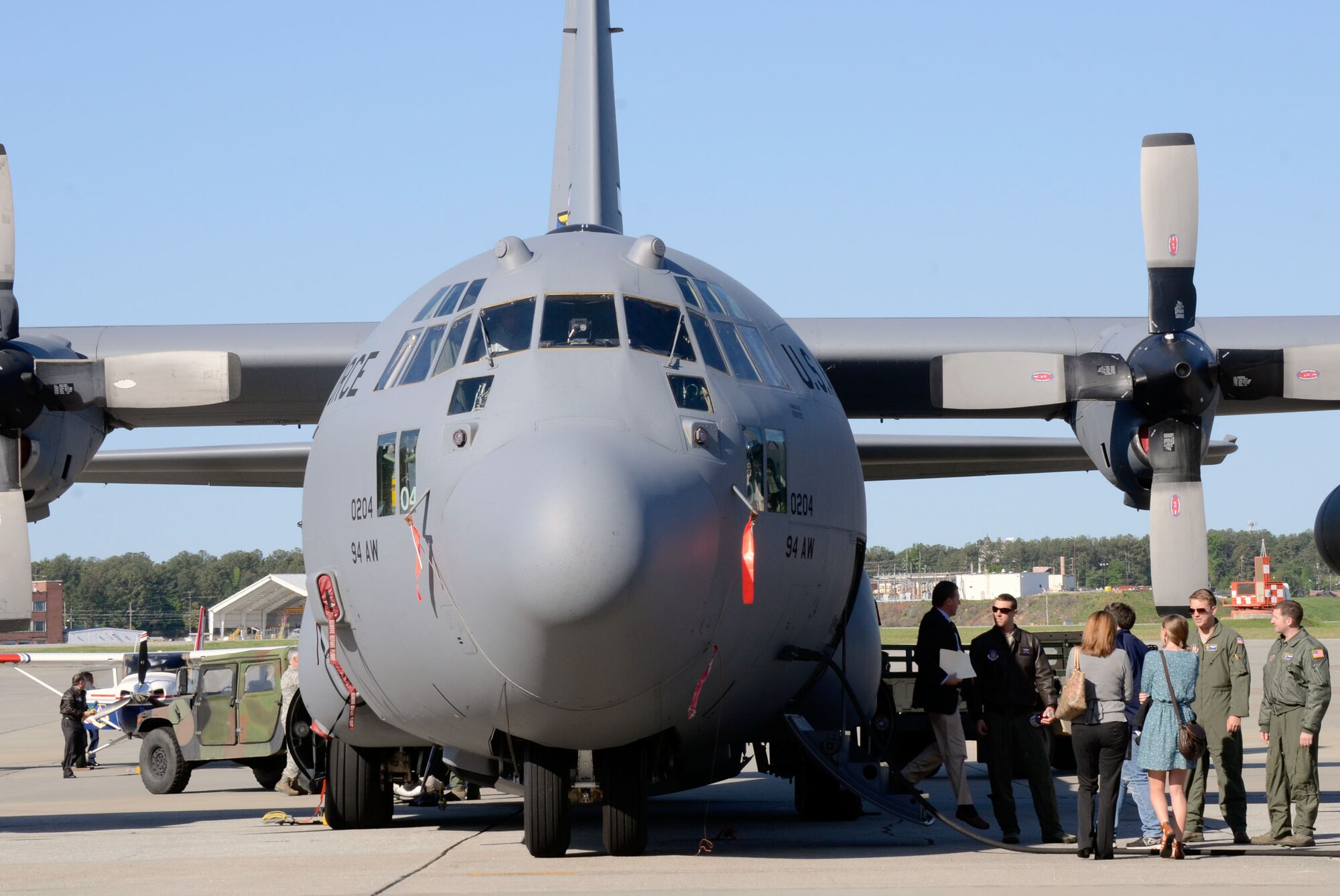 Students and parents walk around, view, and learn about various aircraft on display from Air Force Reserve crew members during the 2013 Georgia Congressional Delegation Academy Day held on Dobbins Air Reserve Base, Ga., April 20. (U.S. Air Force photo/Don Peek)