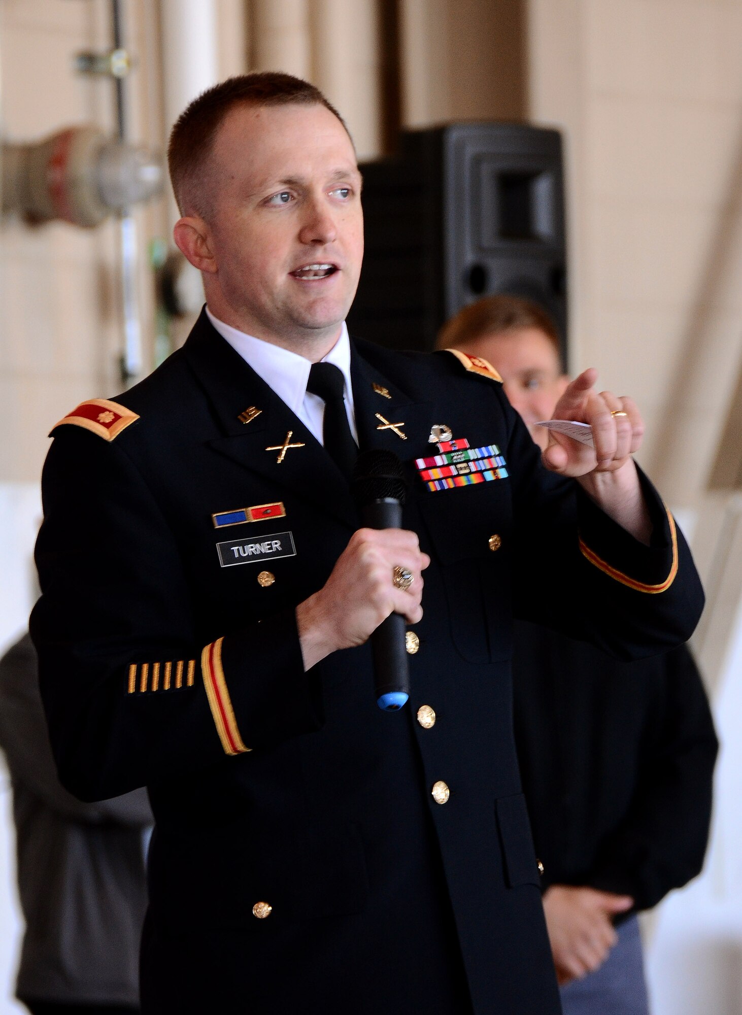 Maj. John  Turner, U.S. Military Academy at West Point, speaks to students and family members about the academy application experience during the 2013 Georgia Congressional Delegation Academy Day held at Dobbins Air Reserve Base, Ga., April 20. (U.S. Air Force photo/Brad Fallin)