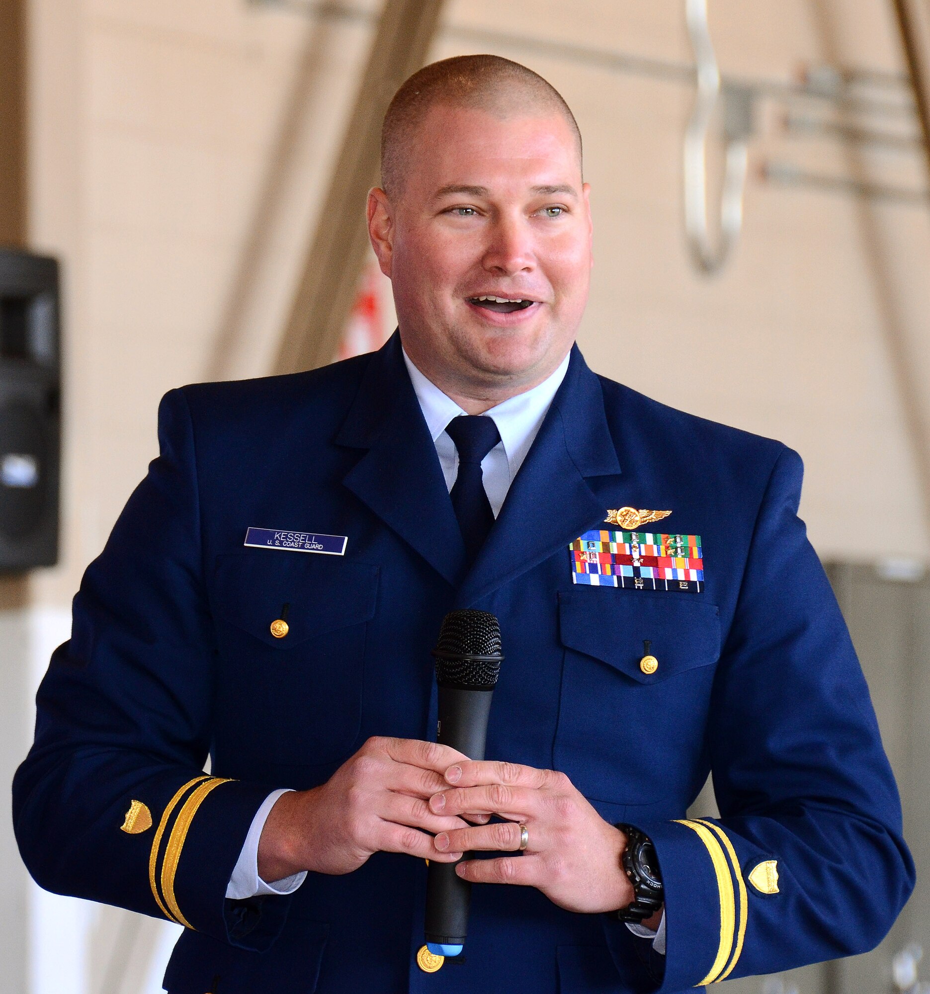 Bob Baude, U.S. Coast Guard Academy, speaks to students and family members about the academy application experience during the 2013 Georgia Congressional Delegation Academy Day held at Dobbins Air Reserve Base, Ga., April 20. (U.S. Air Force photo/Brad Fallin)