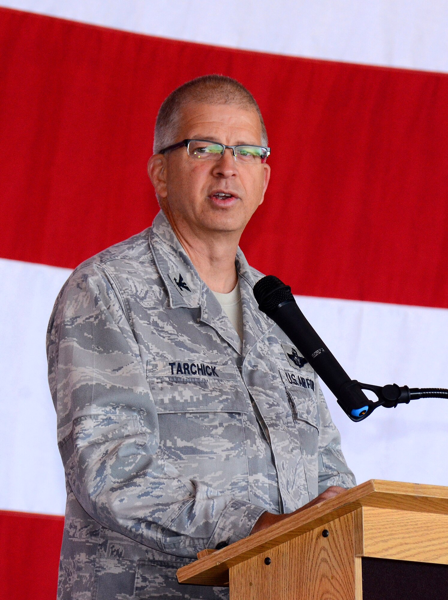 94th Airlift Wing Commander, Col. Tim Tarchick speaks to the students and parents at Academy Day 2013 at Dobbins ARB, April 20. (U.S. Air Force photo/Brad Fallin)