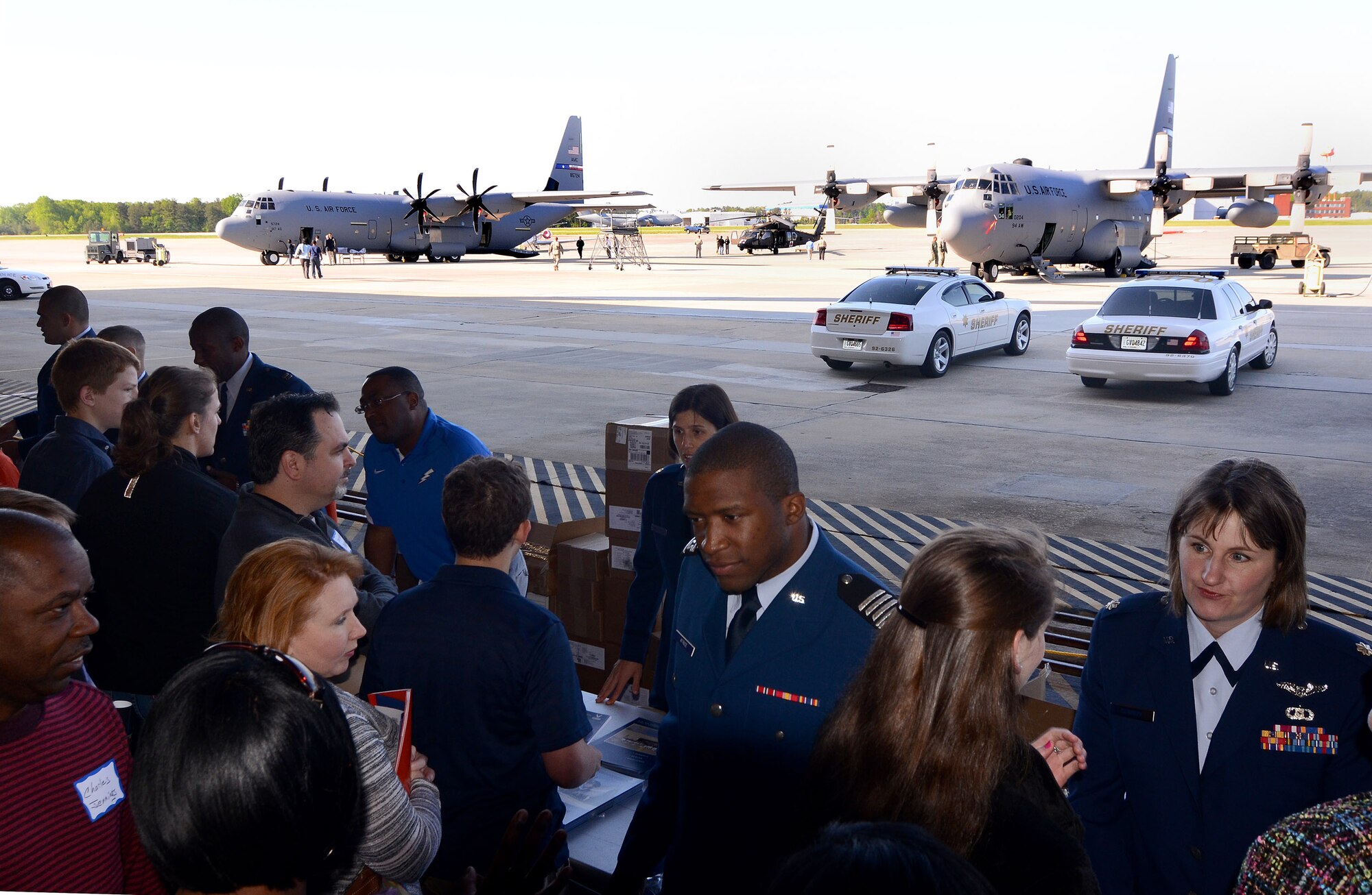 Representatives from the United States Air Force Academy discuss enrollment opportunities with 2013 Academy Day attendees at Dobbins Air Reserve Base, Ga., April 20. The annual event allows high school students the opportunity to meet with representatives from each of the service academies, including West Point, the U.S. Naval Academy, the U.S. Air Force Academy, the Coast Guard Academy, and the U.S. Merchant Marines Academy. (U.S. Air Force photo/Brad Fallin)