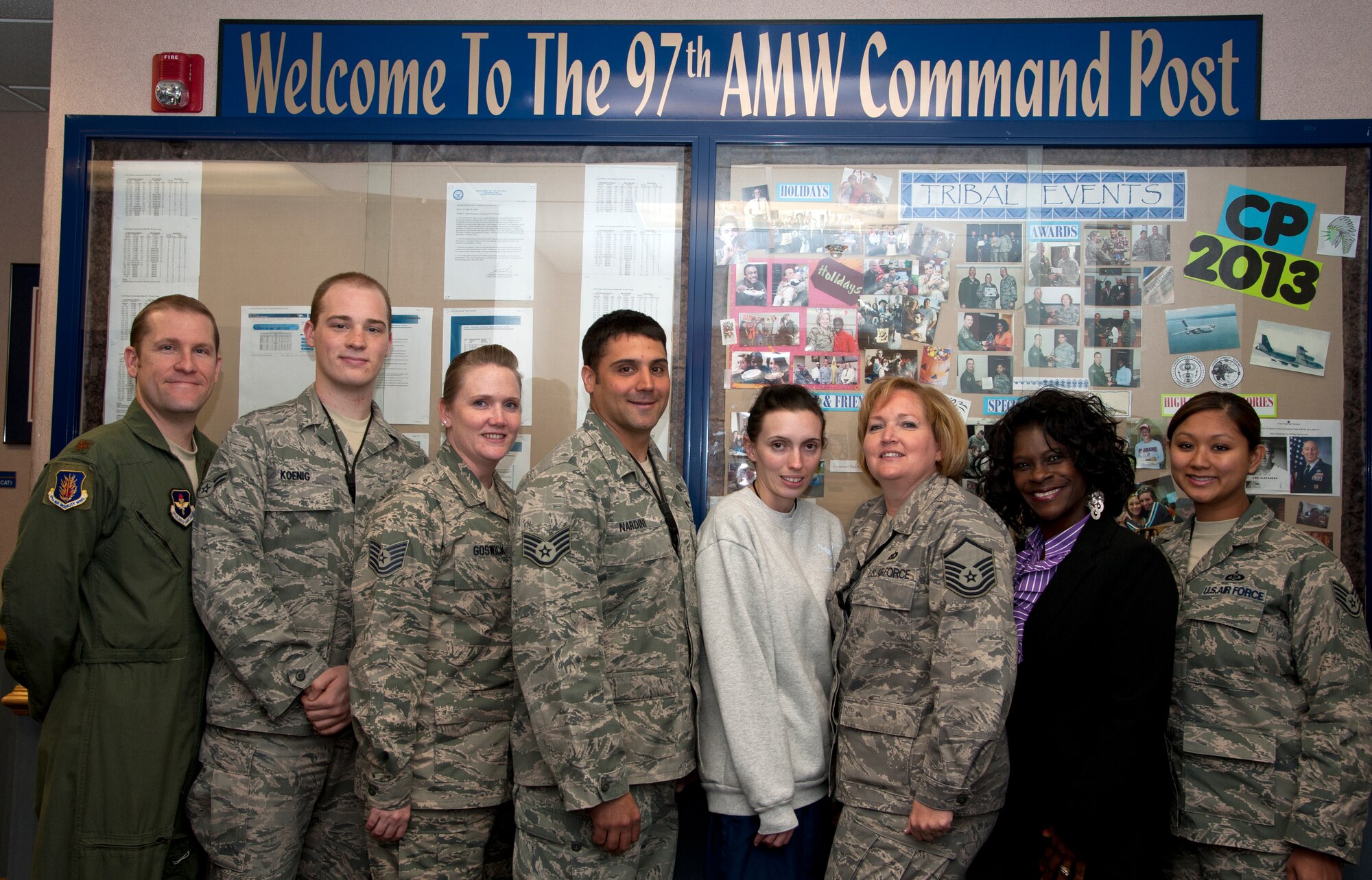 ALTUS AIR FORCE BASE, Okla. -- Members of the 97th Air Mobility Wing Command Post, pose for a photo inside the command post, April 24. The 97th AMW CP recently won the 2012 Air Education and Training Command Large Command Post of the Year Award for the fourth time in the past seven years. (U.S. Air Force photo by Senior Airman Kenneth W. Norman)