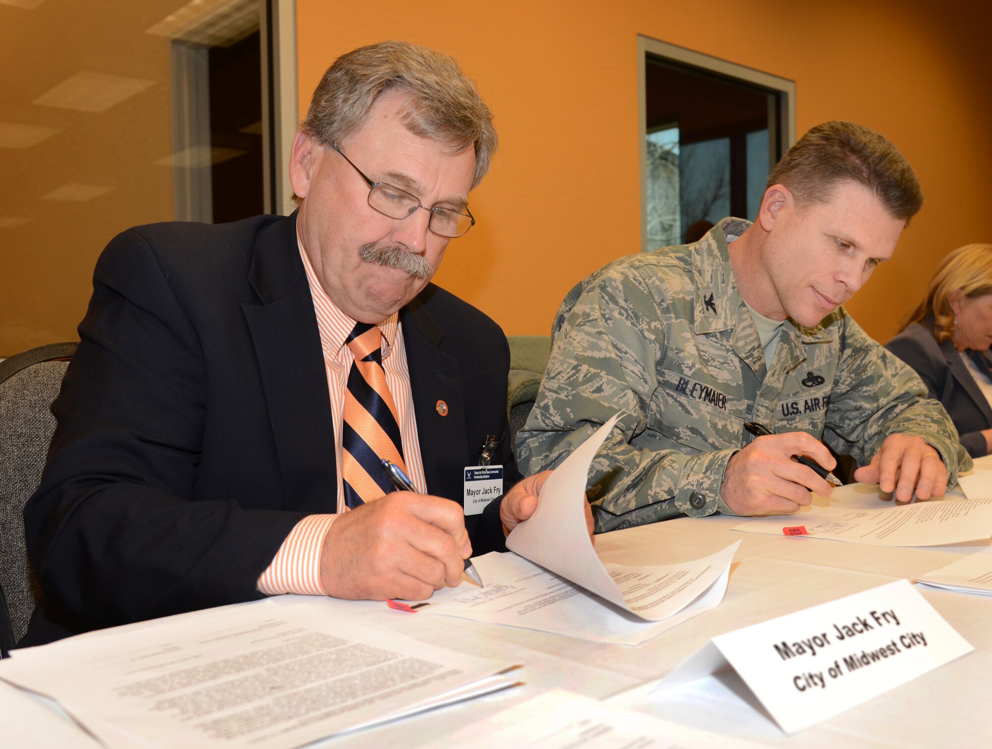 On March 27, Midwest City mayor Jack Fry and Col. Steven Bleymaier, commander of the 72nd Air Base Wing, signed a Memorandum of Understanding dealing with juvenile intervention for minor crimes and a Memorandum of Agreement for jail services. The agreements were reached as part of the Air Force’s “P4” Community Partnership Initiative. (Air Force photo by Kelly White)