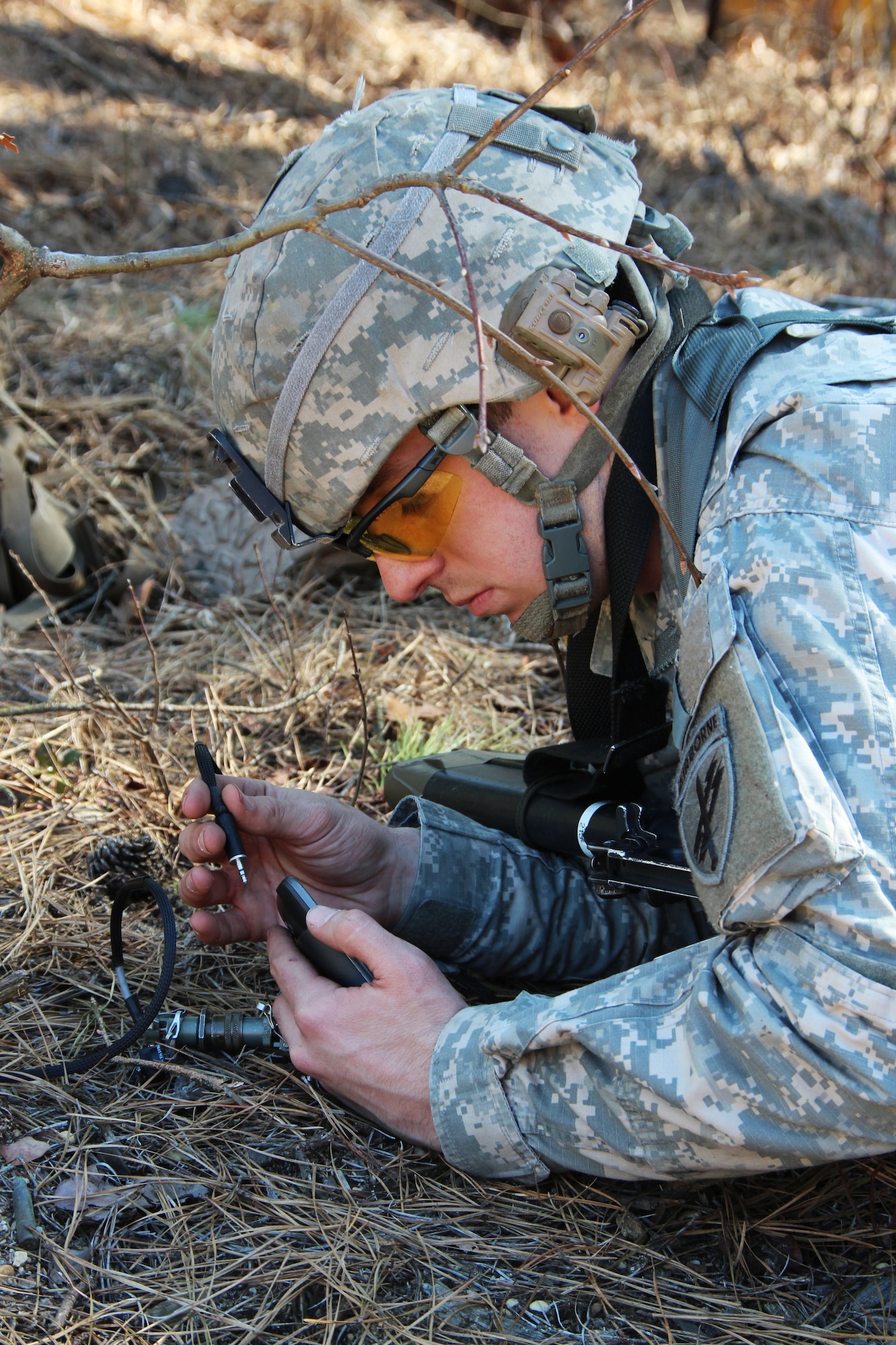 Spc. Roger Jongewaard, 1st Training Brigade, sets up a next generation loud speaker system during the 37F Psychological Operations Specialist reclassification course March 23, 2013, at Joint Base McGuire-Dix-Lakehurst, N.J. The 29-day course compises classroom activities, a tactical situational training exercise and end with a week-long field training exercise. (U.S. Army photo by Sgt. 1st Class Andy Yoshimura/Released)

