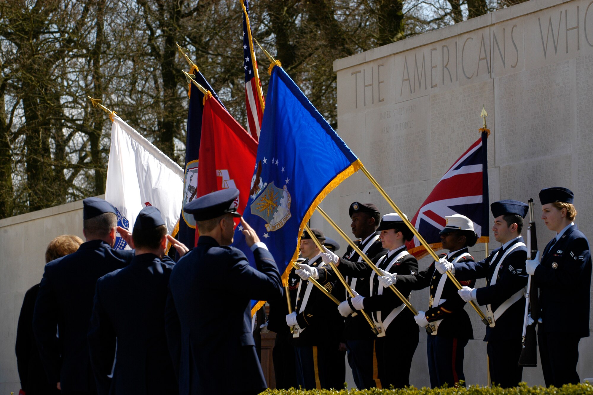 MADINGLEY, United Kingdom – Members of a joint service color guard from the 423rd Air Base Group and its mission partners present the colors during a ceremony at Cambridge American Cemetery, in Madingley, United Kingdom, commemorating the 69th anniversary of the Exercise Tiger tragedy April 23. In all 749 American Soldiers and Sailors died April 27, 1944, during one of several assault rehearsals in Exercise Tiger conducted at Slapton Sands on the Devon coast of England in preparation for the launch of Operation Overlord. (U.S. Air Force photo by Tech. Sgt. Chrissy Best)