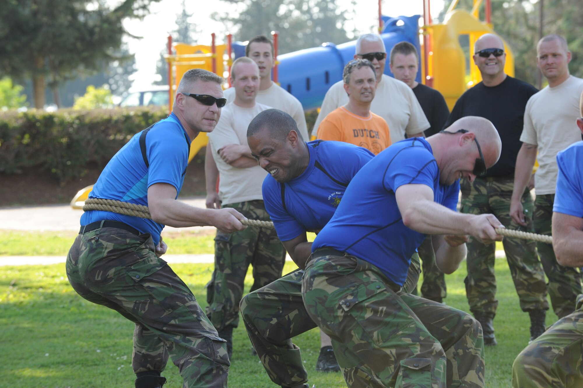 Dutch soldiers participate in a touwtrekken toernooi (tug-of-war tournament) during Koninginnedag, or Queen’s Day,  celebration held at Arkadas Park April 25, 2013, Incirlik Air Base Turkey. The Dutch, who are deployed to Incirlik Air Base as part of a NATO-led operation to boost Turkey’s air defense capabilities by providing Patriot missile batteries, invited U.S. and Turkish personnel to attend the event that included Dutch food, the touwtrekken toernooi , live music and a bonfire. (U.S. Air Force photo by 1st Lt. David Liapis/Released)