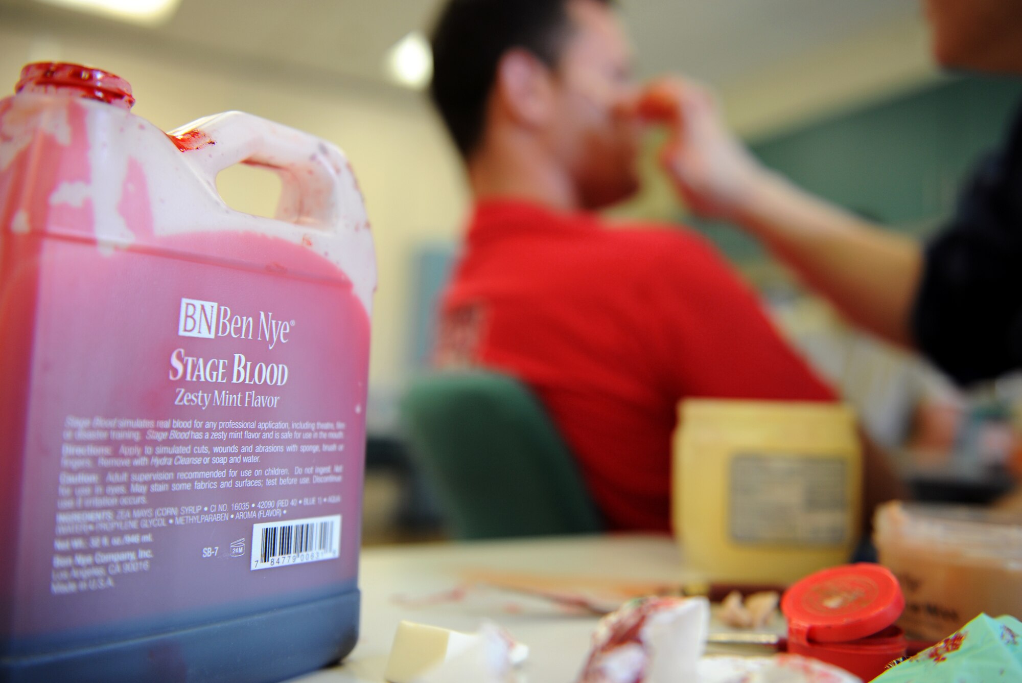 18th Medical Group moulage supplies sit on a table in the Schilling Community Center on Kadena Air Base, Japan, April 24, 2013. The make-up was used to simulate injuries and severe wounds to victims of a tour bus crash during the emergency management exercise happening later that day. (U.S. Air Force photo by Airman 1st Class Keith A. James/Released)