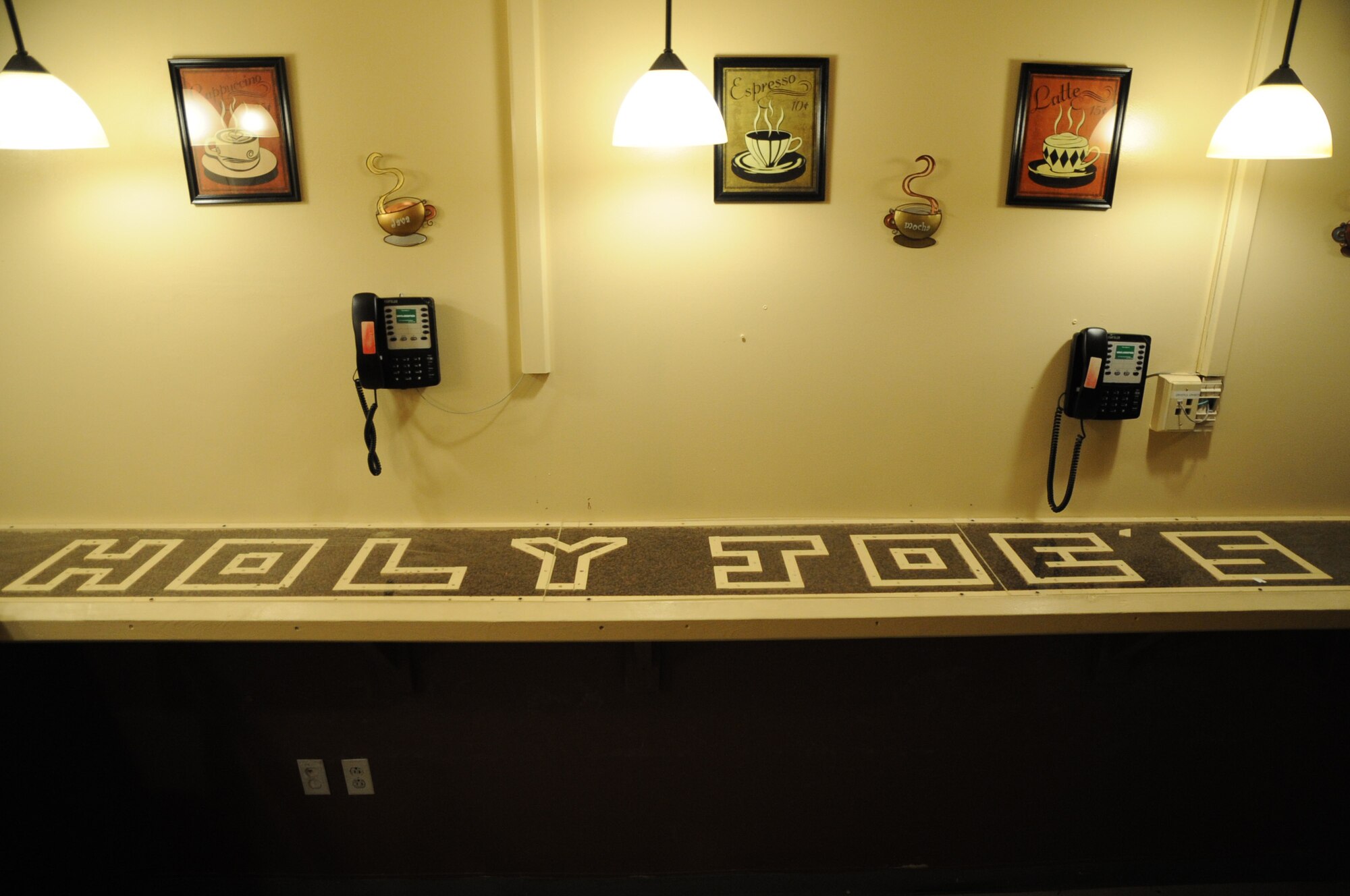 "Holy Joe's" was created from a nondescript storeroom by members of the chapel team and 455th Expeditionary Medical Group. The renovation included new cabinets and counters, as well as installation of extra phones to provide a place for staff and visitors to take a break from the fast pace of hospital operations. (U.S. Air Force photo by Staff Sgt. David Dobrydney)