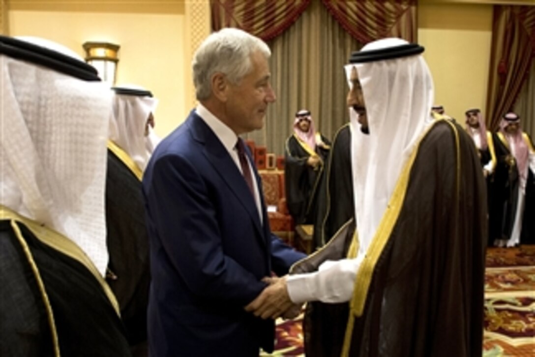 Secretary of Defense Chuck Hagel, left,¬ shakes hands with Crown Prince and Minister of Defense Salman bin Abdulaziz al Saud before a meeting in Riyadh, Saudi Arabia, on April 23, 2013.  The Kingdom of Saudi Arabia is Hagel's third stop on a six-day trip to the Middle East to meet with defense counterparts.  