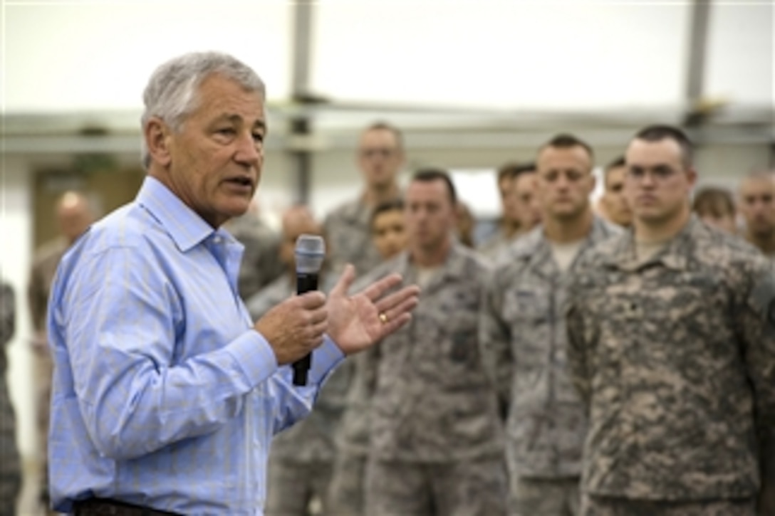 Secretary of Defense Chuck Hagel talks to airmen at an undisclosed location in Southwest Asia on April 25, 2013.  Hagel thanked the troops for their service and answered various questions including those on the effects of sequestration on the Air Force as well as sanctions on Iran.  