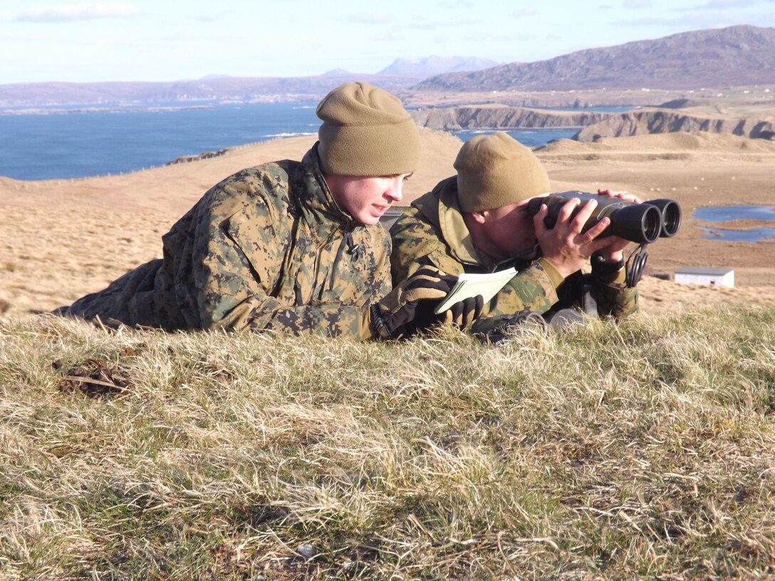 Lance Cpl. Antonio Ramirez assists Lance Cpl. Keith Bohannon, in calling in precision naval gunfire during Exercise Joint Warrior 13.1 in Cape Wrath, Scotland, April 19. 

Joint Warrior 13.1 or JW 13.1, is an enduring NATO exercise supported by the ANGLICO community to facilitate joint collective training and pre-deployment training for UK, NATO and Allied units and their staffs in preparation for employment as part of a Combined Joint Task Force. The exercise featured 60 separate naval units, operating at points around the coast of Scotland, April 15-25.

“Joint Warrior is conducted in the spring and autumn of each year and provides training for all three UK armed services as well as visiting units from allied nations,” said James Krajicek, U.S. Marine Corps Forces Europe, planning and assessments officer. “The seas and skies around Orkney played host to elements of the largest tactically focused military exercise in Europe.”
 
Countries taking part in the maritime part of the exercise included the United Kingdom, Belgium, Germany, Holland, France, Norway, Denmark, Canada and Sweden.

Ramirez and Bohannon are both forward observers with 2nd ANGLICO Co., 2nd Marine Division, out of Camp Lejeune, N.C.

