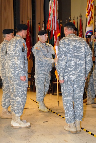 FORT MCPHERSON, Ga. (May 4, 2009) - Lt. Gen. William G. Webster, U.S. Army Central commanding general, passes the colors to Command Sgt. Major John Fourhman, USARCENT command sergeant major, at a change of command ceremony at Fort McPherson, Ga., May 4. Webster comes to USARCENT after serving as the deputy commander of U.S. Northern Command and vice commander of the U.S. Element, NORAD, headquartered at Peterson Air Force Base in Colorado.

Photo by Sgt. Beth Lake
