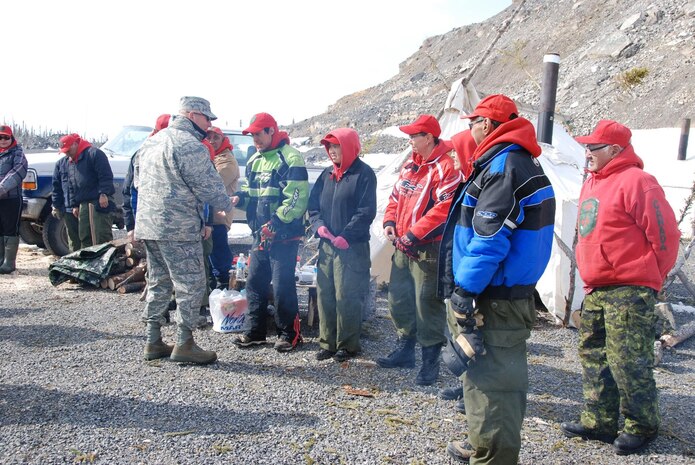 General Gene Renuart, is greeted by a patrol of Canadian Rangers in the Mackenzie River Delta near Inuvik, Northwest Territories May 11. Canadian Rangers are part-time reservists providing a military presence in remote, isolated and coastal communities. Formally established in 1947, Canadian Rangers are responsible for protecting Canada's sovereignty by reporting unusual activities or sightings, collecting local data of significance to the Canadian Forces, and conducting surveillance or sovereignty patrols as required. There are currently 4,200 Canadian Rangers in 165 communities across Canada.

Photo by Wendy Gilmour
