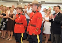 Members of the Royal Canadian Mounted Police are recognized by the crowd, including Colorado Springs Mayor, Lionel Rivera (Far Right), during the 2009 Canada Day events at the Penrose House Wednesday, July 1 in Colorado Springs, Colo. On July 1, 1867, Canada was founded as a federation and this year Canadians celebrate Canada’s 142nd anniversary.  NORAD is the bi-national Canadian and American command responsible for the air defense of North America and maritime warning for Canada and the United States.