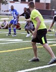 Marines aboard Marine Corps Air Station New River participate in the Ultimate Frisbee Jamboree, April 11. 