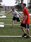 Marines aboard Marine Corps Air Station New River participate in the Ultimate Frisbee Jamboree at the astroturf field by the AS-4000 fitness center, April 11. 