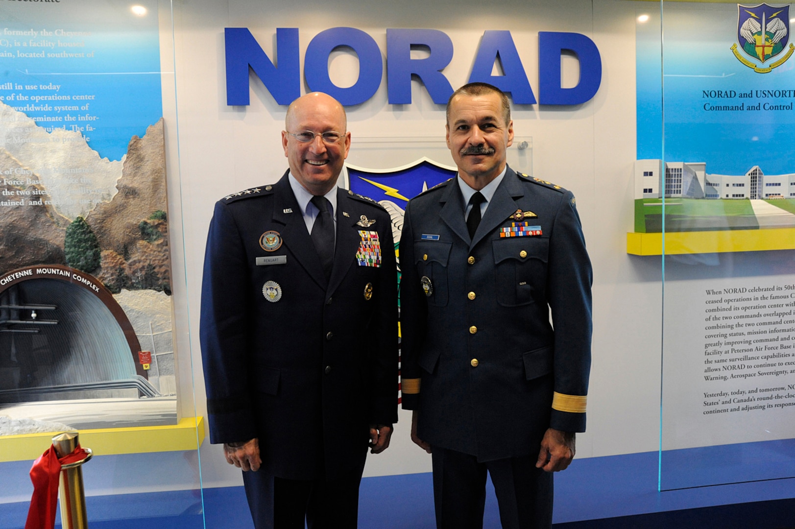 WASHINGTON, D.C. – Air Force Gen. Gene Renuart, North American Aerospace Defense Command and U.S. Northern Command commander, and Canadian Lt.-Gen. J.M. Duval, NORAD deputy commander, pose for a photo at the NORAD Corridor Exhibit ribbong cutting ceremony at the Pentagon April 28. 

(Photo by Juan R. Tricoche)