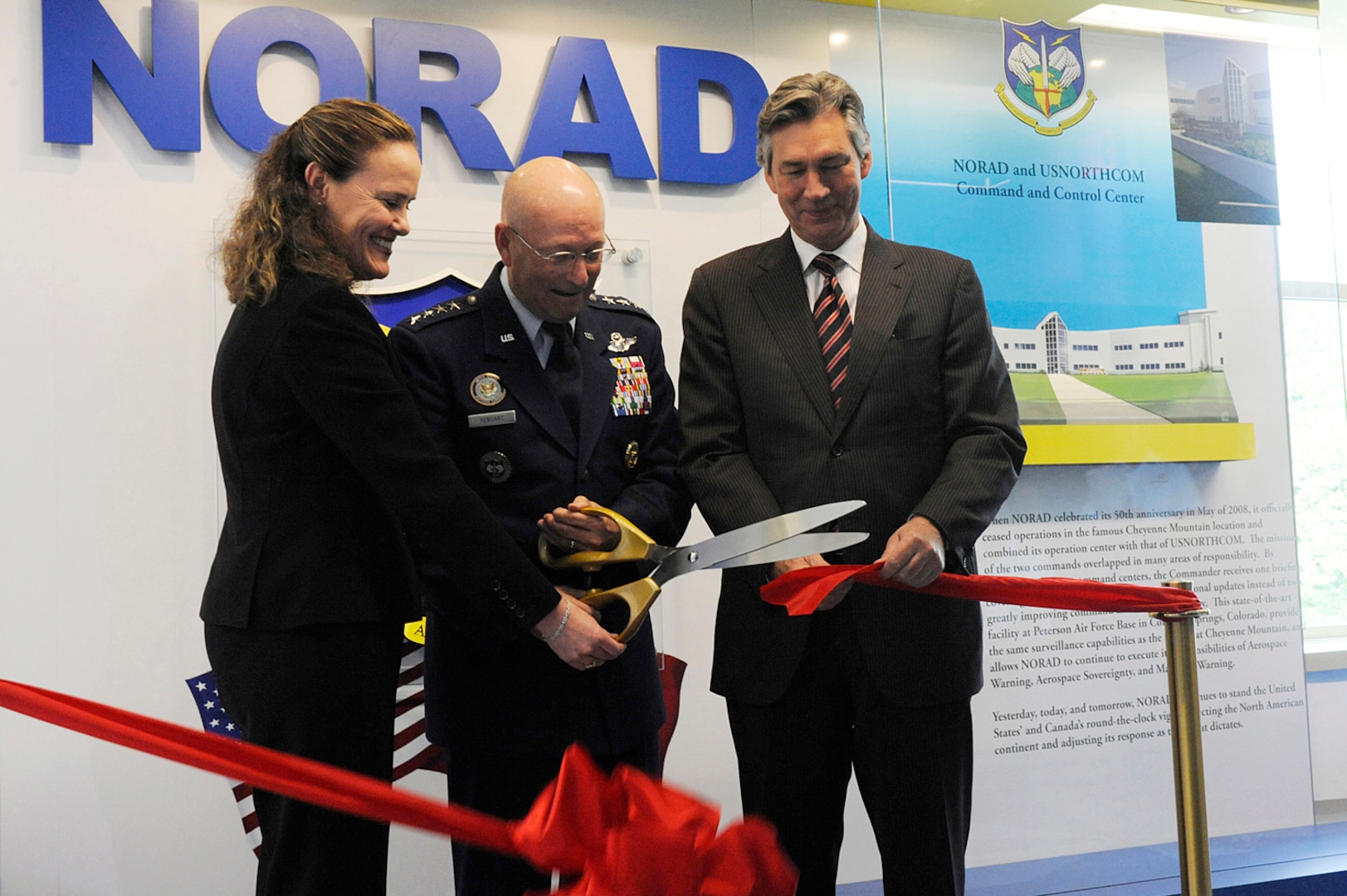 WASHINGTON, D.C. – Michèle Flournoy, Under Secretary of Defense for Policy; Air Force Gen. Gene Renuart, North American Aerospace Defense Command and U.S. Northern Command commander; and Ambassador Gary Doer, Ambassador of Canada to the United States, cut the ribbon, officially opening the NORAD Corridor Exhibit during a ceremony at the Pentagon April 28. 

(Photo by Juan R. Tricoche) 
