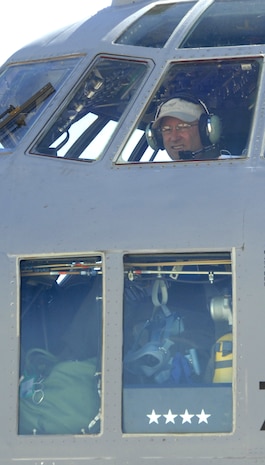 Air Force Gen. Gene Renuart, North American Aerospace Defense Command and U.S. Northern Command commander, conducts preflight checks aboard a 302nd Airlift Wing C-130 before his final flight at Peterson Air Force Base May 5. Renuart has flown with the Air Force Reserve unit since taking command of NORAD and U.S. NORTHCOM in 2007. (U.S. Air Force photo by Staff Sgt. Thomas J. Doscher)