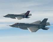 OVER FORTH WORTH, Texas - F-35A Lightning II joint strike fighters complete a test flight from the Lockheed plant in Fort Worth, Texas, May 11. The Government of Canada announced it would acquire 65 of the fifth generation fighters as part of the modernization of the Canadian Forces. 

(Photo by David Drais) 

