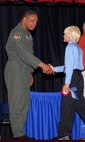 TYNDALL AIR FORCE BASE, Fla. - Air Force Maj. Gen. Garry C. Dean, 1st Air Force commander, shakes Tyndall Elementary School 5th Grader Cody George’s hand during the school’s 5th Grade Recognition Ceremony June 4.

(Courtesy photo)