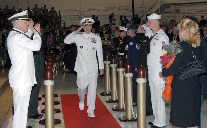 PETERSON AIR FORCE BASE, Colo. - Navy Adm. James Winnefeld, North American Aerospace Defense Command and U.S. Northern Command commander, salutes the side boys as he is piped out at the conclusion of the commands' change of command ceremony at Peterson Air Force Base, Colo., May 19. Winnefeld comes to NORAD and U.S. NORTHCOM from an assignment as Director for Strategic Plans and Policy on the Joint Staff. He has served as commander of the U.S. Sixth Fleet, commander of a aircraft carrier strike group and commander of the aircraft carrier USS Enterprise. 

(U.S. Air Force photo by Staff Sgt. Thomas J. Doscher) 

