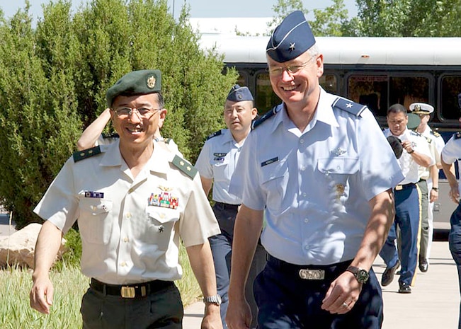 SCHRIEVER AIR FORCE BASE, Colo. – Japan Ground Self Defense Force Maj. Gen. Koichi Isobe, Japan Joint Staff Director for Defense Plans and Policy, and Air Force Brig. Gen. Jeff Newell, Joint Staff Deputy Director for Politico-Military Affairs for Asia, tour Schriever Air Force Base during the U.S. – Japanese joint staff talks July 15. As part of the conference, the Japanese military members were given tours of Schriever AFB and Cheyenne Mountain Air Force Station. 

(Photo by Carol Floyd) 

