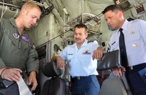 Master Sgt. Lamont Wood (left) explains the layout of a Modular Airborne Firefighting System II control panel to Canadian Lt. Gen. J.M. Duval (center) and Chief Master Sgt. W. Allen Usry during a 302nd Airlift Wing-sponsored presentation on Air Force Reserve missions to senior U.S. Northern Command officials July 26 at Peterson Air Force Base, Colo. The visit, headed by Navy Adm. James A. Winnefeld, Jr., the North American Aerospace Defense Command/NORTHCOM commander, helped to give the senior leaders a better understanding of the specialized missions the AF Reserve supports, as well as the capabilities it can provide to civilian-related missions if called upon. General Duval is the NORAD deputy commander, while Chief Usry is the senior enlisted advisor for NORAD/NORTHCOM. Sergeant Wood is a C-130 Hercules loadmaster within the 302nd AW. (U.S. Air Force photo/Staff Sgt. Stephen J. Collier)