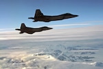 OVER ALASKA - A pair of F-22 fighters escort Fencing 1220, a Gulfstream 4 simulating a hijacked airliner, over Alaska as part of Exercise VIGILANT EAGLE Aug. 8. VIGILANT EAGLE is a cooperative exercise involving the North American Aerospace Defense Command and the Russian Air Force. The exercise scenario creates a situation that requires both the Russian Air Force and NORAD to launch or divert fighter aircraft to investigate and follow a "hijacked" airliner. The exercise focuses on shadowing and the cooperative hand-off of the monitored aircraft between fighters of the participating nations. 

(U.S. Army photo by Maj. Mike Humphreys) 

