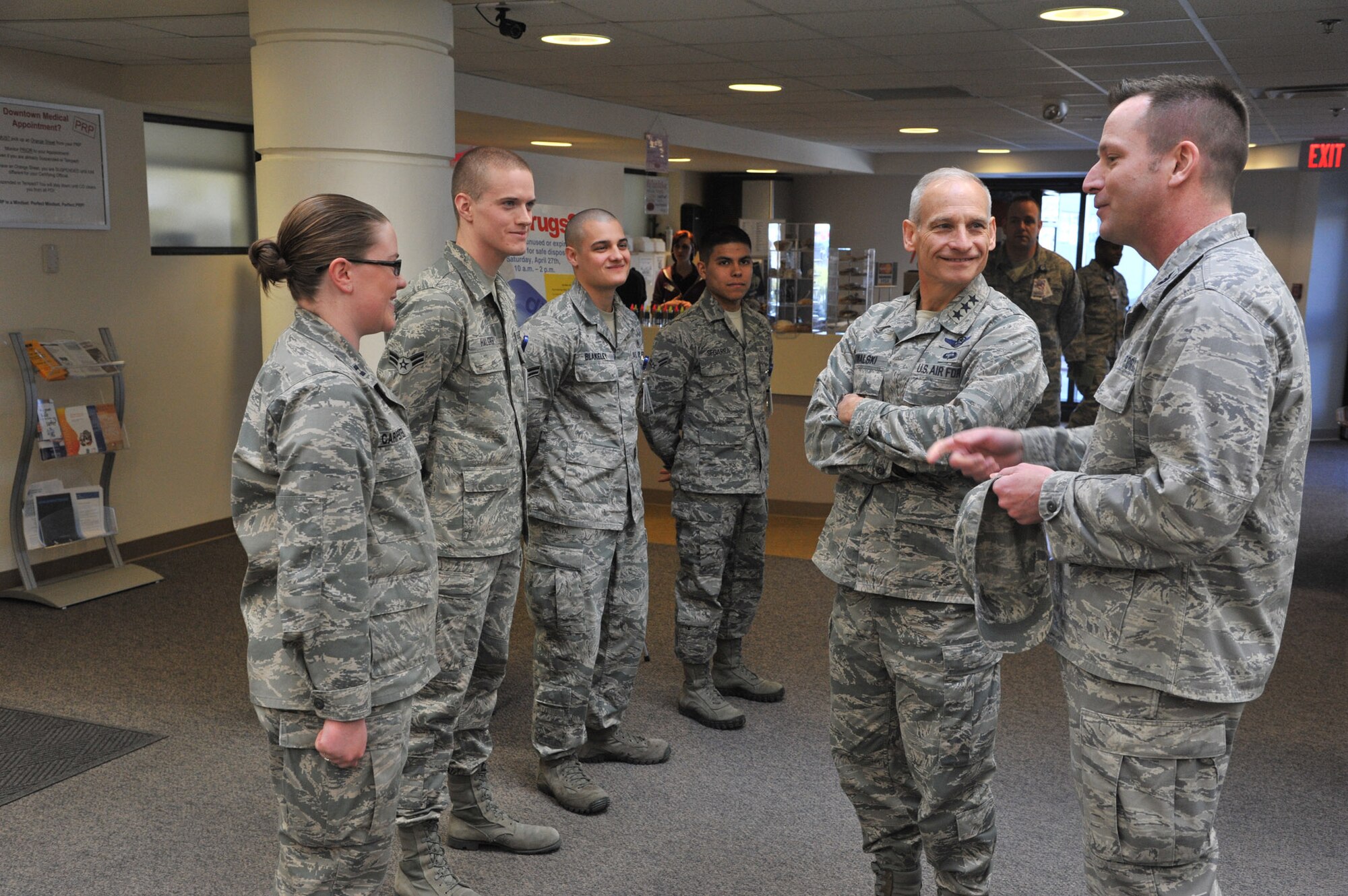 Col. Bruce Roehm, 341st Medical Group commander (right), and Lt. Gen. James Kowalski, commander of Air Force Global Strike Command, visit with four “unsung heroes” of the 341st Medical Group during a tour of the base clinic April 23.  The “unsung heroes” pictured from left to right are Capt. Julie Carpenter, Airman 1st Class Brek Halgren, Airman 1st Class Casey Blakeley and Airman 1st Class Charles Segarra. (U.S. Air Force photo/John Turner)
