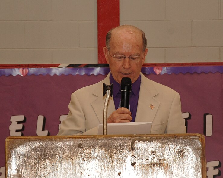 The Honorable Lorenz Walker, Mayor of Bossier City, reads a proclamation during the Purple Up Day Mayoral Proclamation event at Elm Grove Middle School, Bossier City, La., April 26, 2013. The proclamation proclaimed April 26 National Purple Up Day. The event was held to show support for military students and families. (U.S. Air Force photo/Senior Airman Sean Martin)