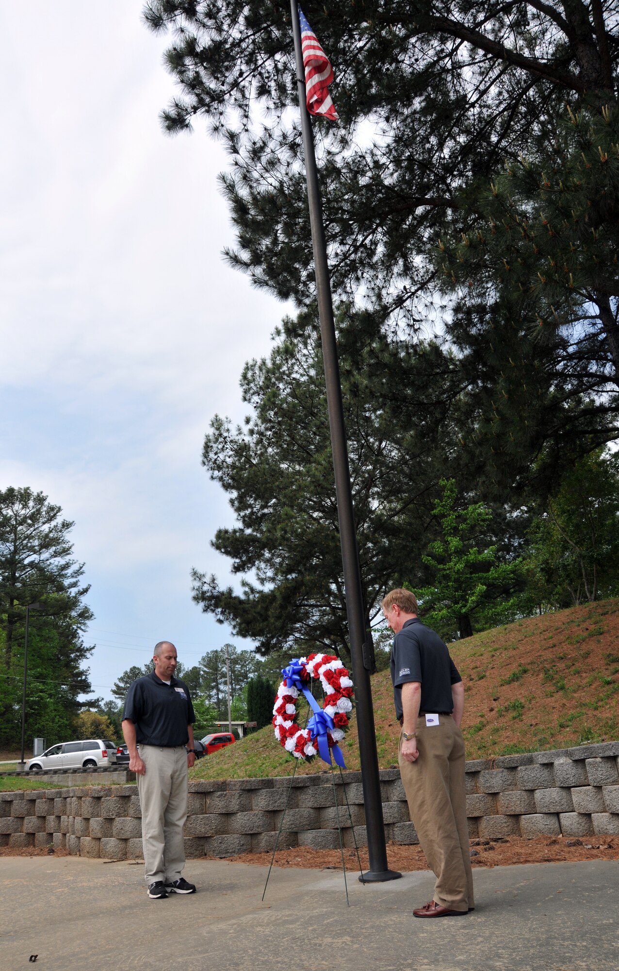 Col. Timothy Tarchick, 94th Airlift Wing commander, met with members of the Cobb Leadership program on April 17 at the POW/MIA park on Dobbins Air Reserve base. Tarchick observed a moment of silence to remember those who have made the ultimate sacrifice as members of Cobb Leadership presented a wreath. (U.S. Air Force photo/Senior Airman Elizabeth Van Patten)