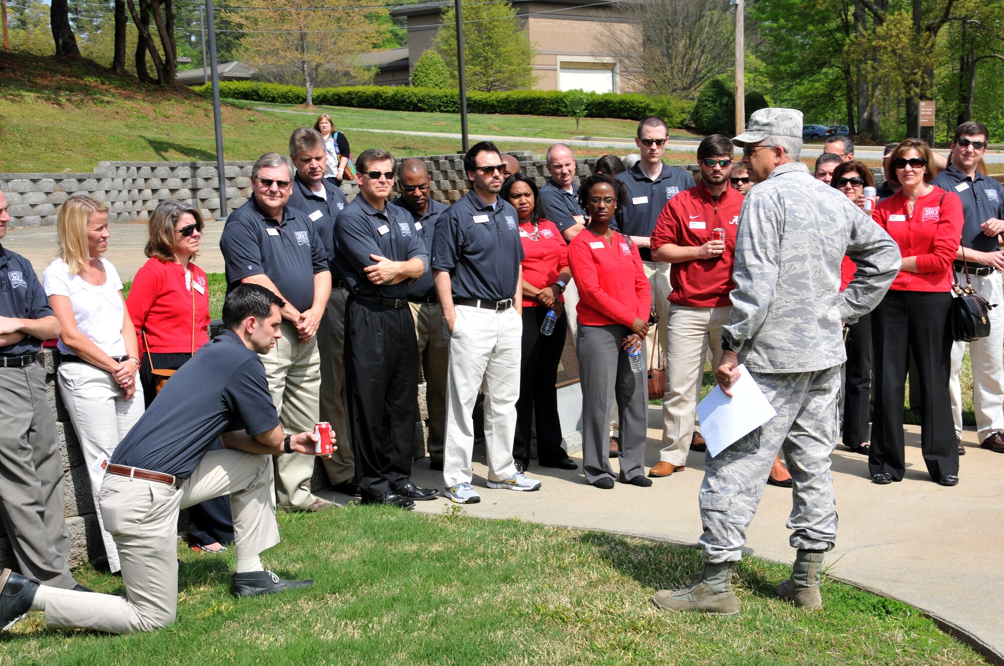 Col. Timothy Tarchick, 94th Airlift Wing commander, met with members of the Cobb Leadership program on April 17 at the POW/MIA park on Dobbins Air Reserve base. Cobb Leadership was invited to the base to learn more about the missions of the various units on Dobbins ARB. Tarchick shared his leadership philosophy and answered questions. (U.S. Air Force photo/Senior Airman Elizabeth Van Patten)
