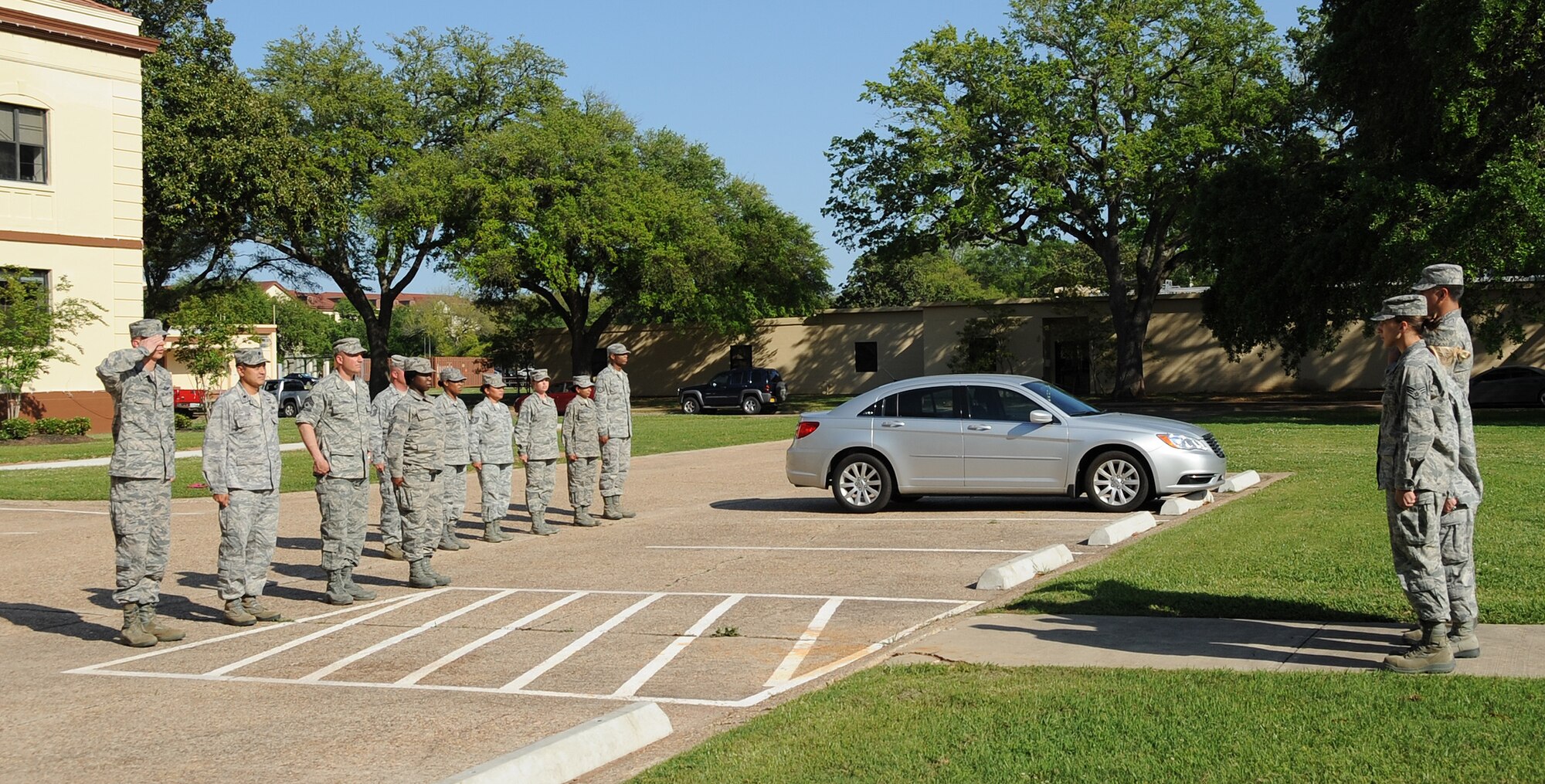 Airman Leadership School class 13-4 students retire the colors during retreat on Barksdale Air Force Base, La., April 25, 2013. The retreat ceremony serves a two-fold purpose- it signals the end of the official duty day and pays respect to the flag. (U.S. Air Force photo/Airman 1st Class Benjamin Gonsier)